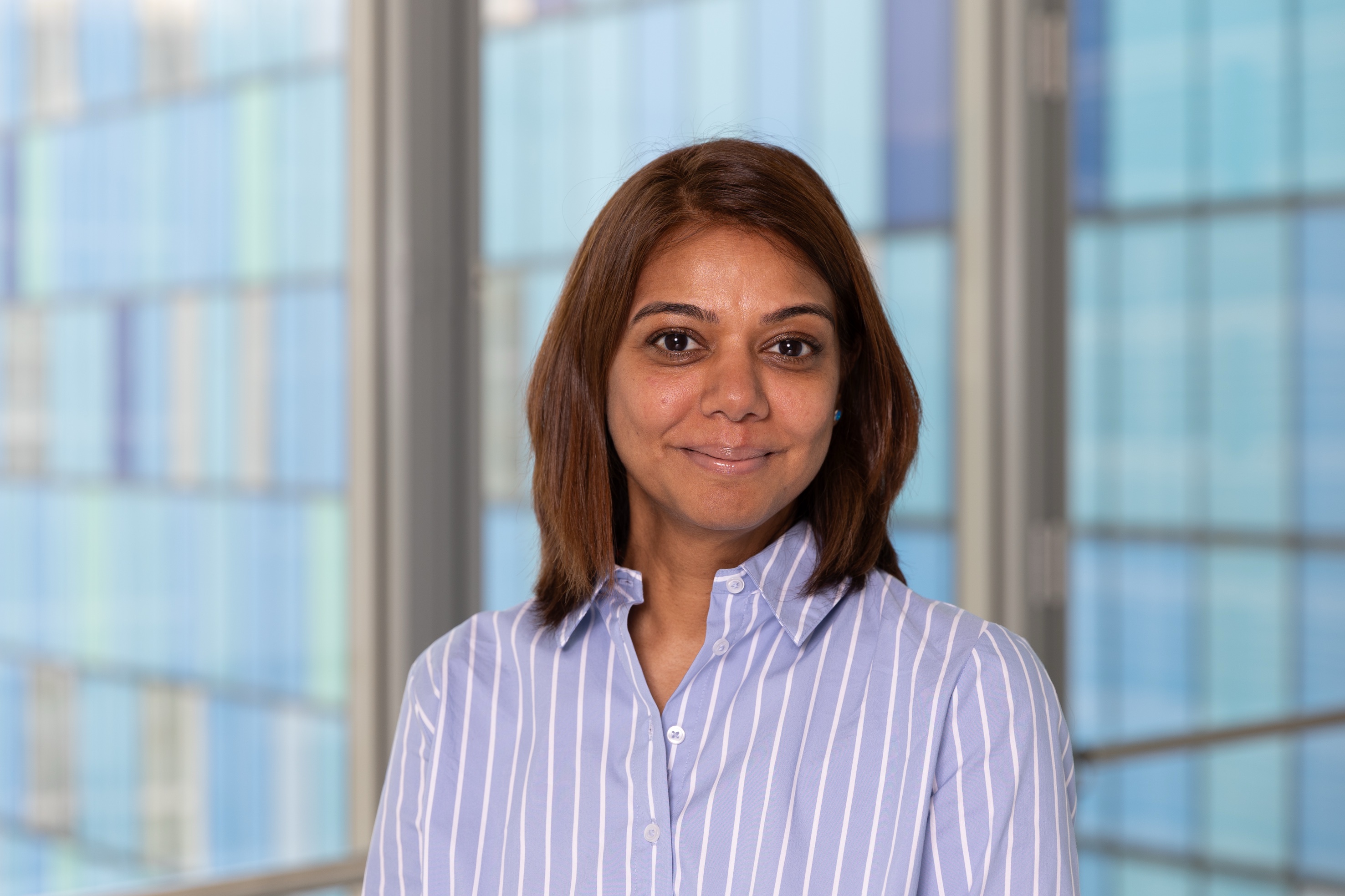 Headshot of Simmi Naidu