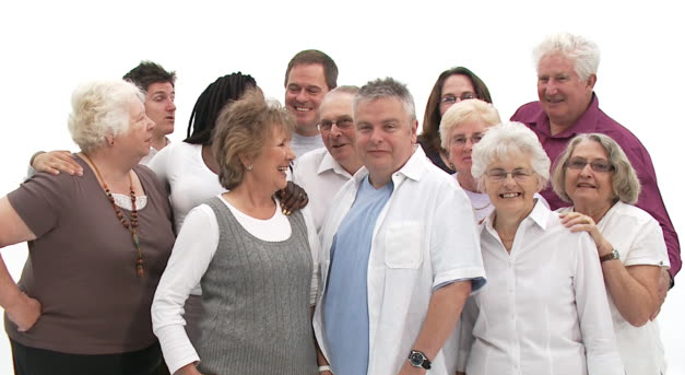 Group of people standing close together