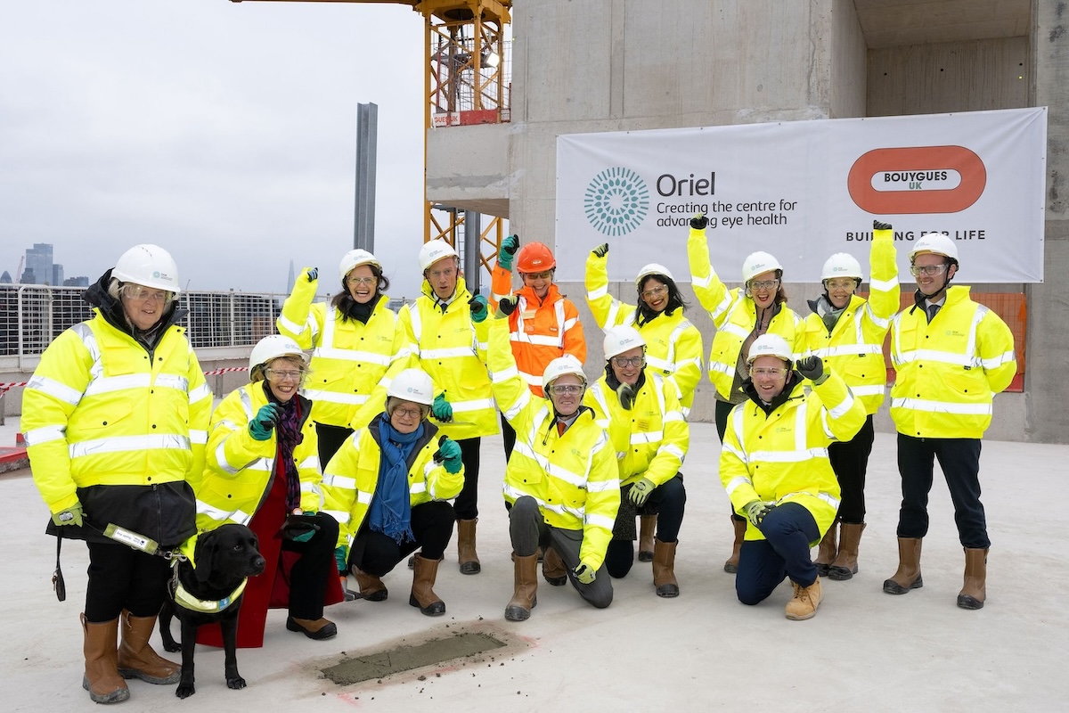 Group photo of completing the exterior builf on the new Oriel site