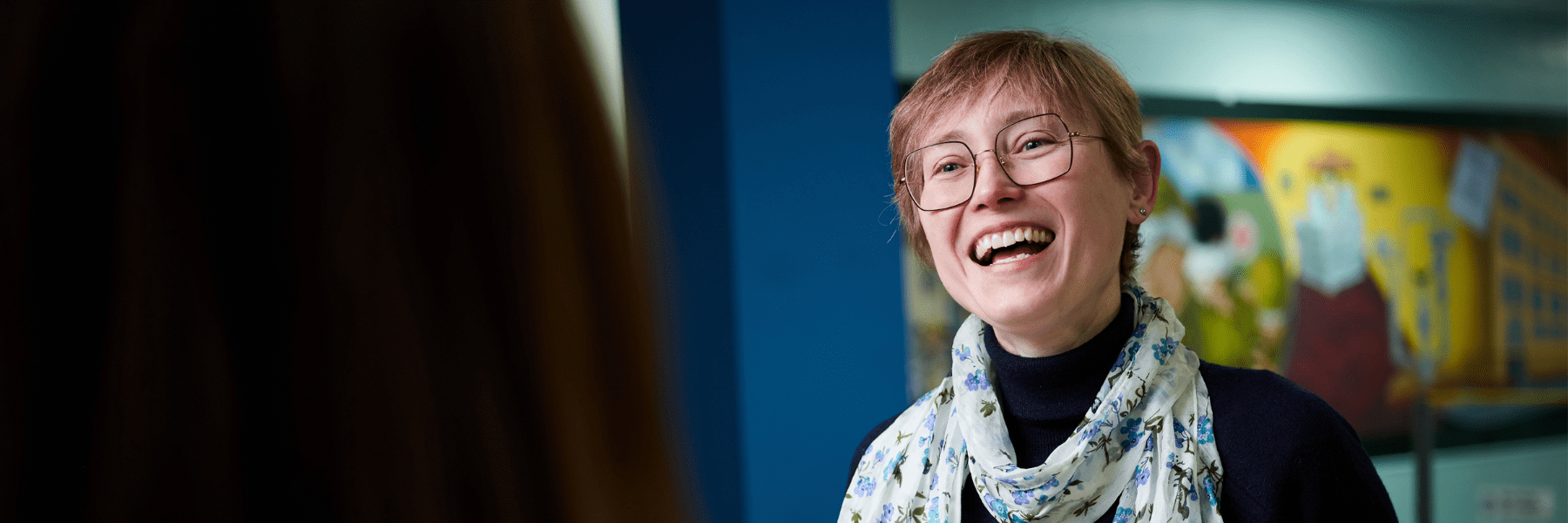 Moorfields staff member smiling: Dagmara headshot in the hospital
