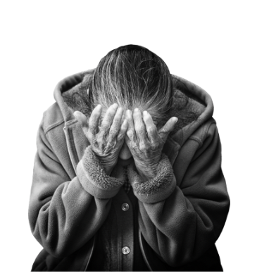 Black and white image of a person with their head in their hands