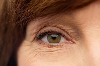 A close up of a mature woman's eye