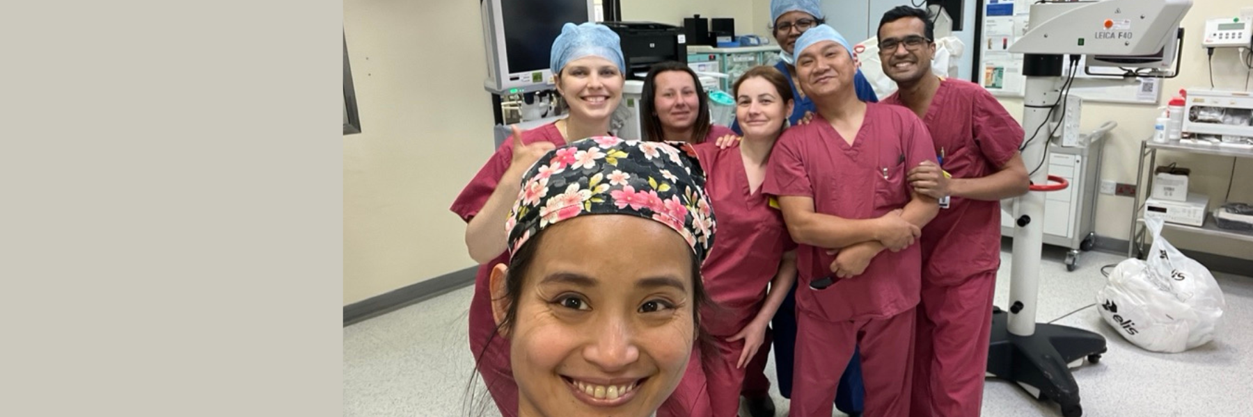 Cataract surgical team standing together in a surgical theatre