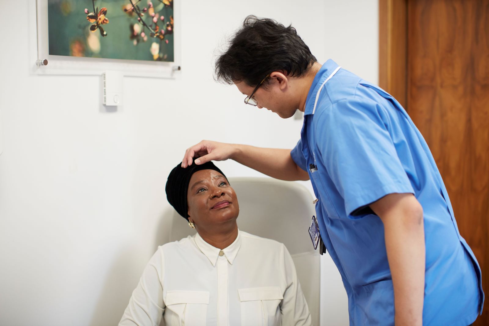 Patient receiving eye drops